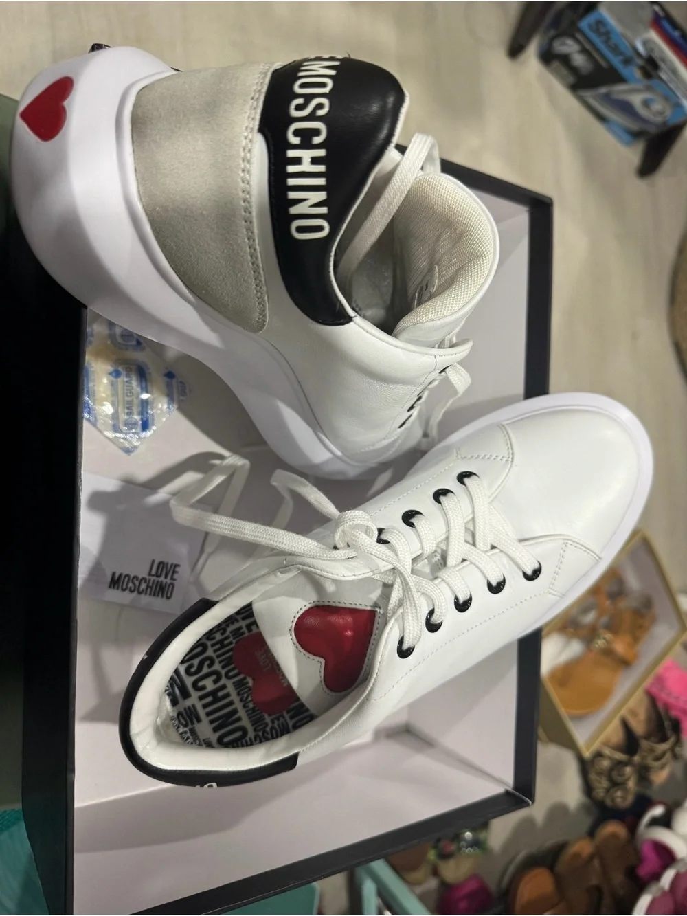 Moschino White Leather Sneakers with Red Heart Accent
